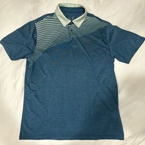 Under Armour Golf Polo. Strechy material very comfortable shirt. Dry fit feel